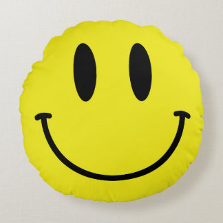 Coussin rond de visage et de jaune triste de