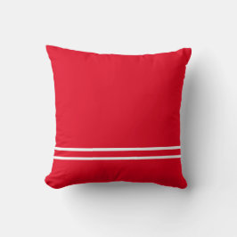 Coussin rouge avec lignes blanches