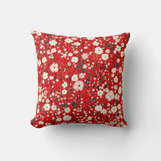 Coussin rouge vif aux fleurs blanches et roses
