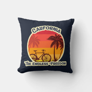 Coussin Silhouette de bicyclette de plage au coucher du so