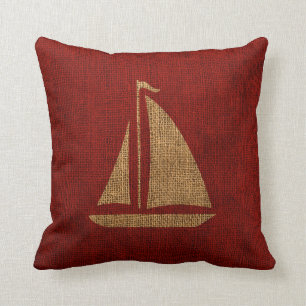 Coussin Silhouette de voilier en rouge rustique