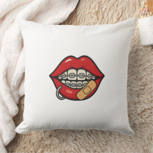 Coussin Sticker à lèvres de dessin avec accolades et perça