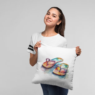 Coussin taches colorées sur une plage en aquarelle