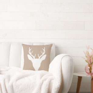 Coussin Tête de cerf blanc sur fond beige