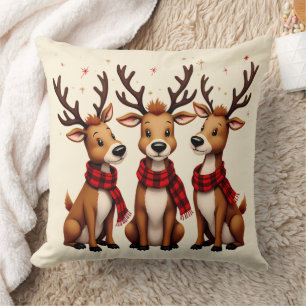 Coussin Trio de rennes de Noël mignon avec des carreaux