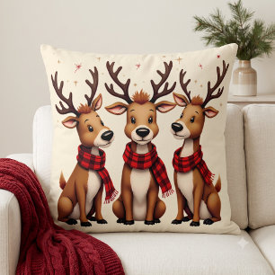 Coussin Trio de rennes de Noël mignons avec des écharpes à