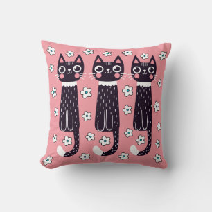 Coussin Trois chats noirs, fleurs de marguerite sur fond r
