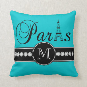 Coussin Turquoise 00c5cd Paris noir décoré d'un monogramme