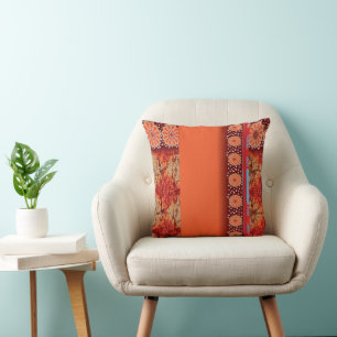 Coussin un design d'un motif rouge et or