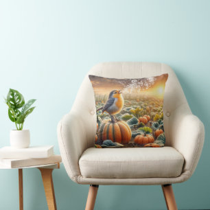 Coussin Un oiseau chante sur un Citrouille