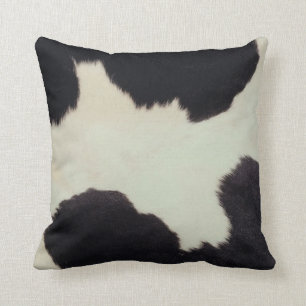 Coussin Vache noire et blanche cachée