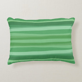 coussin vert motif courbé