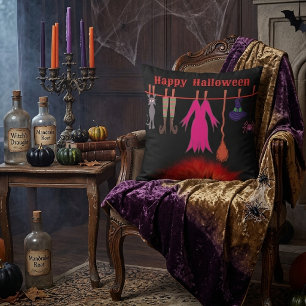 Coussin Vêtements de sorcière fantaisistes sur une corde à