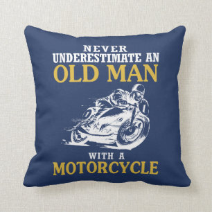 COUSSIN VIEIL HOMME AVEC UNE MOTO