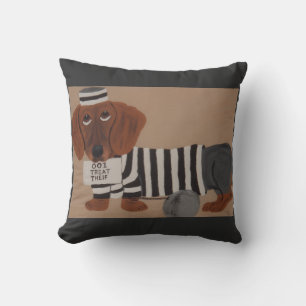 Coussin Voleur de friandises pour teckel prisonnier de la 