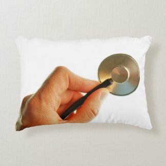 Coussins Décoratifs Stethoscoop in een hand voor een ziekenhuis sfeer.