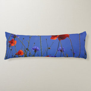 Coussins Longs roses rouges et violets embrassant un ciel et un s
