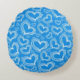COUSSINS RONDS BLEU CLAIR AVEC COEURS BLANCS ET FLEURS