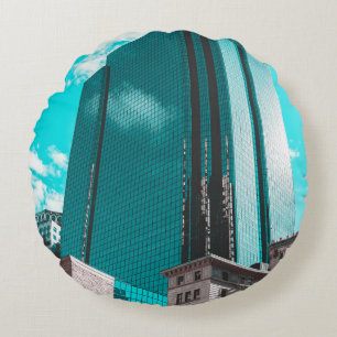 COUSSINS RONDS BLUE CURTAIN WALL BUILDING UNDER TEAL SKIES