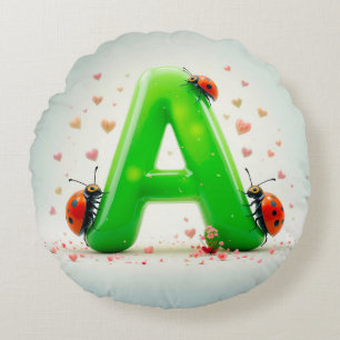 Coussins Ronds Jolies coccinelles sur la lettre verte de l'alphab