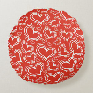 COUSSINS RONDS ROUGE CLAIR AVEC COEURS BLANCS ET FLEURS