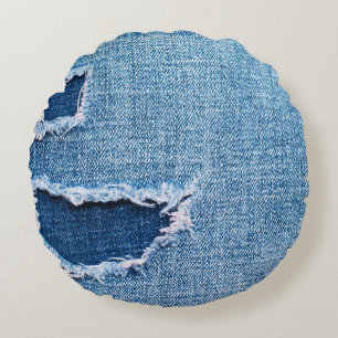 Coussins Ronds Tissu en denim déchiré, teintes bleues.