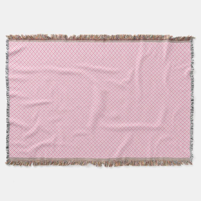 Couverture A decorative pink throw blanket with a subtle  (Devant)