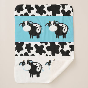 Couverture bleue de Sherpa de motif de vache