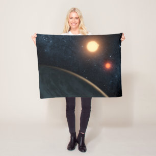 Couverture Polaire Concept de l'artiste illustrant Kepler-16b.