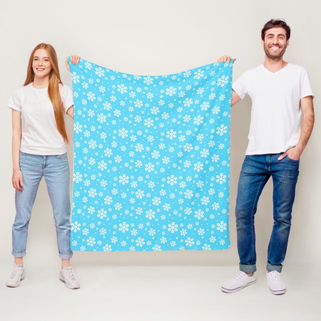 Couverture Polaire Flammes de neige blanches sur Motif d'hiver bleu c (En situation)