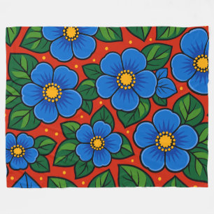 Couverture Polaire Fleurs bleues et feuilles vertes sur fond rouge
