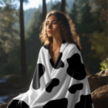 Impression de vache noire et blanche