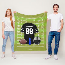 Jersey de football noir et gris sur le terrain