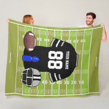 Jersey de football noir et gris sur le terrain