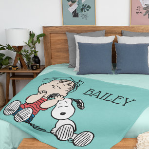 Couverture Polaire Linus consolé avec l'oreille de Snoopy