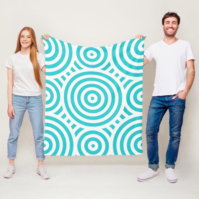 Couverture Polaire Motif circulaire imbriqué Turquoise et Blanc (En situation)