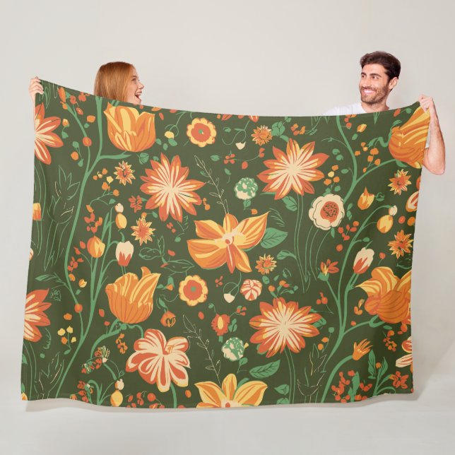 Couverture Polaire Motif floral dynamique avec fleurs orange et jaune (En situation)