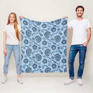 Couverture Polaire Motif floral élégant sur fond bleu clair