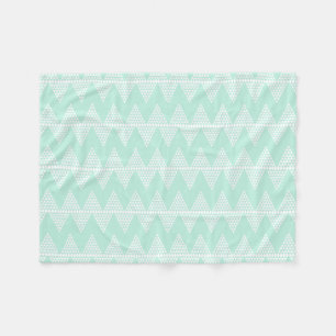 Couverture Polaire Motif géométrique blanc vert en bon état de