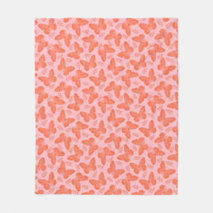Couverture Polaire Motif papillon orange sur arrière - plan rose