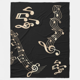 Couverture Polaire Notes de musique dorées sur fond noir moyen
