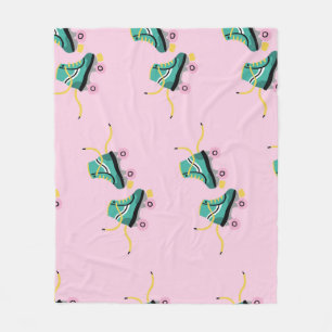 Couverture Polaire Patins à rouleaux rétrogrades : motif rose.