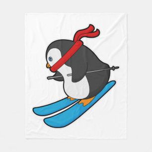 Couverture Polaire Pingouin comme skieur avec ski