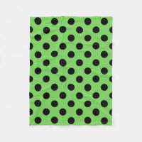 pois noirs sur le vert citron