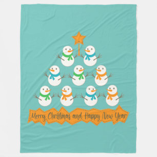 Couverture Polaire Pyramide des sapins de Noël faite de bonhommes de