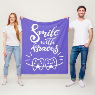 Couverture Polaire Sourire avec les dents de sourire des croisillons