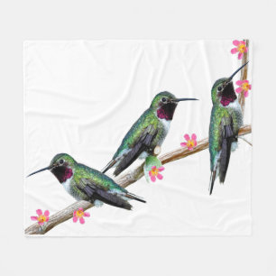 Couverture Polaire Trois colibris perchés sur une branche d'une fleur