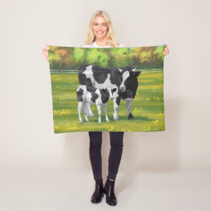 Couverture Polaire Vache Holstein et veau mignon en pâturage d'été