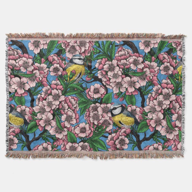 Couverture Rameaux bleus dans le cerisier en fleurs sur le bl (Devant)