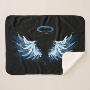 Couverture Sherpa Blue Glowing Angel Wings on black background